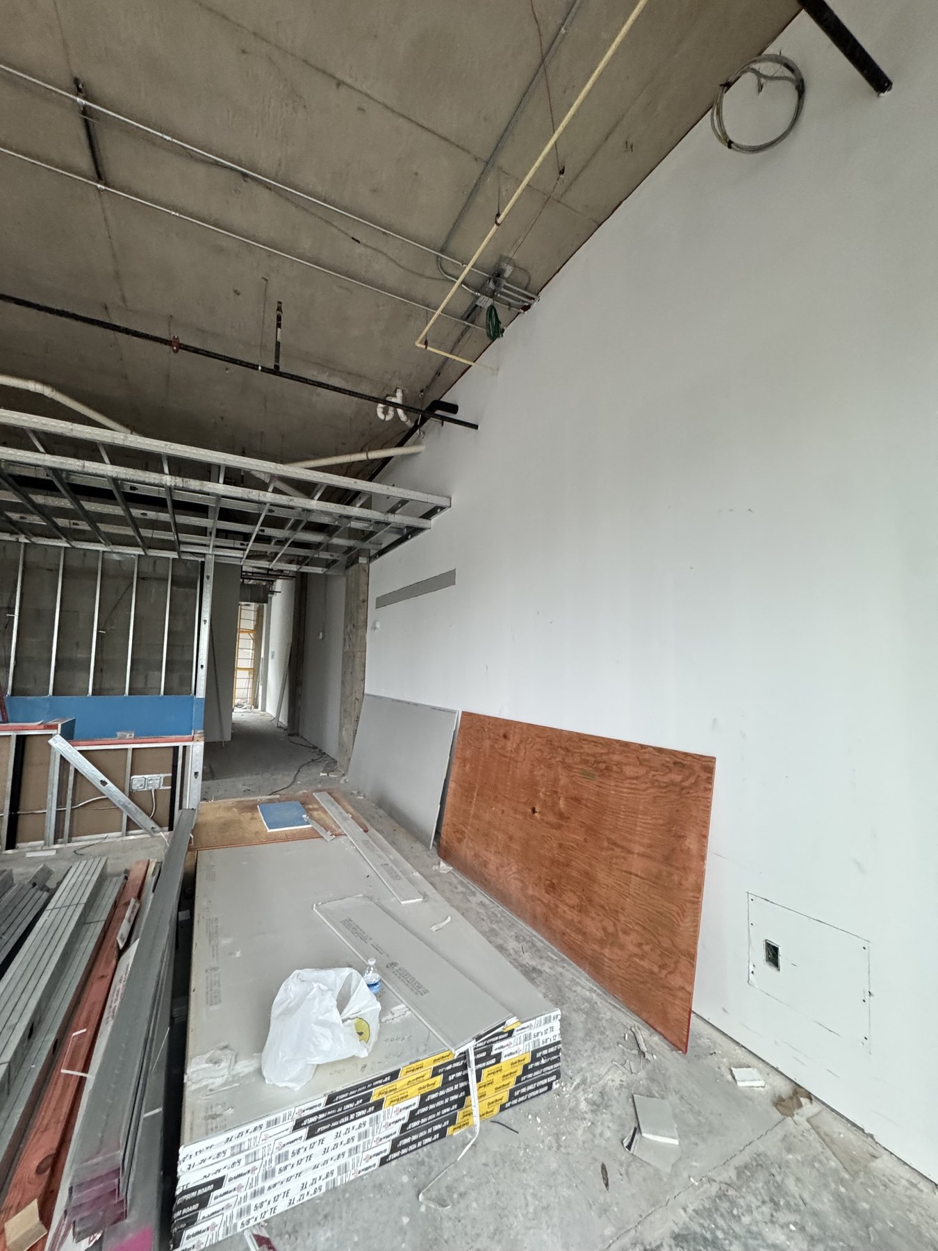 Updated construction photo looking along the long interior wall