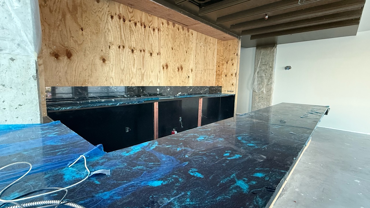 Installed main countertop with protective film at Libations