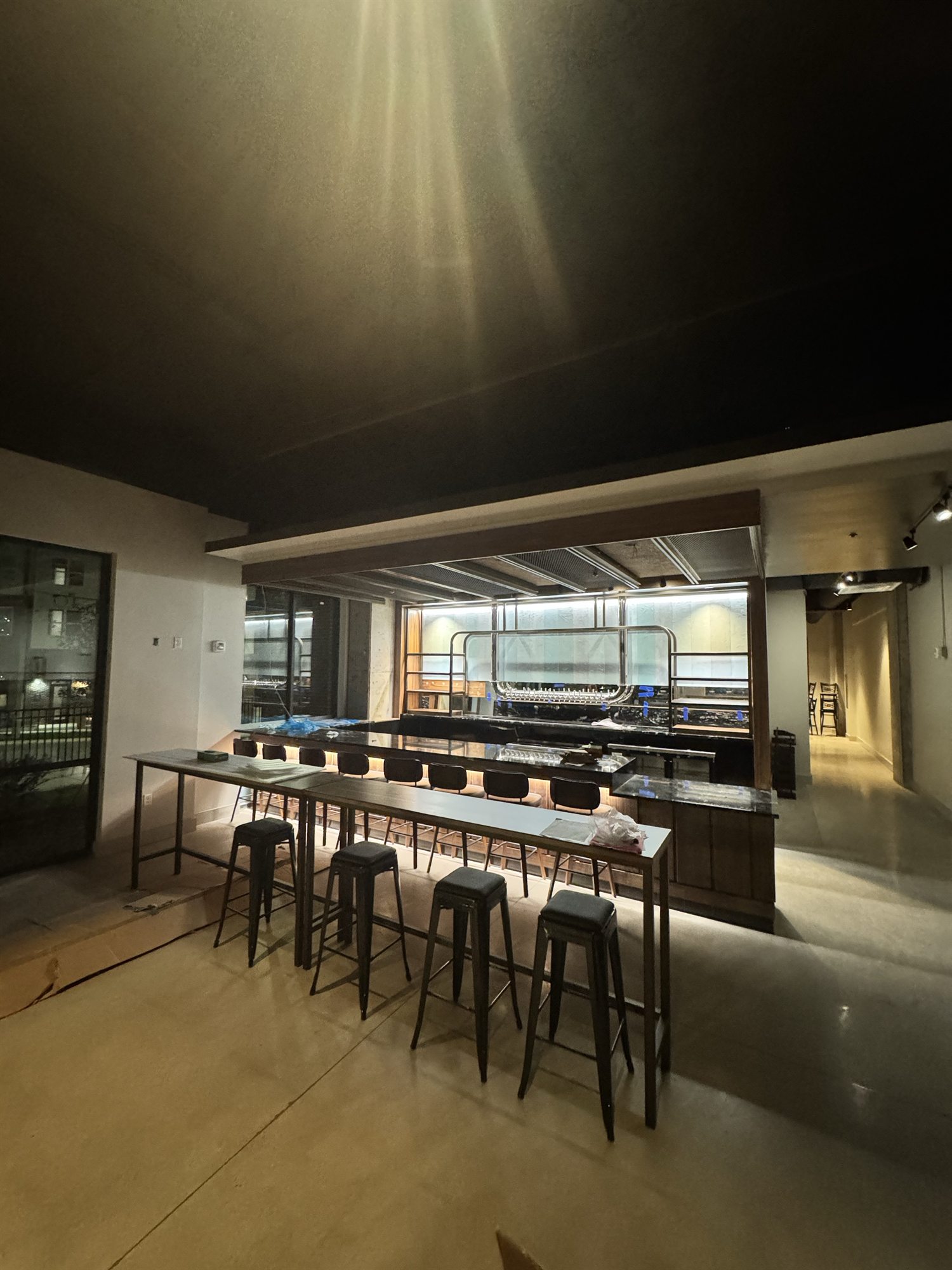 Front room seating and completed bar area at Libations