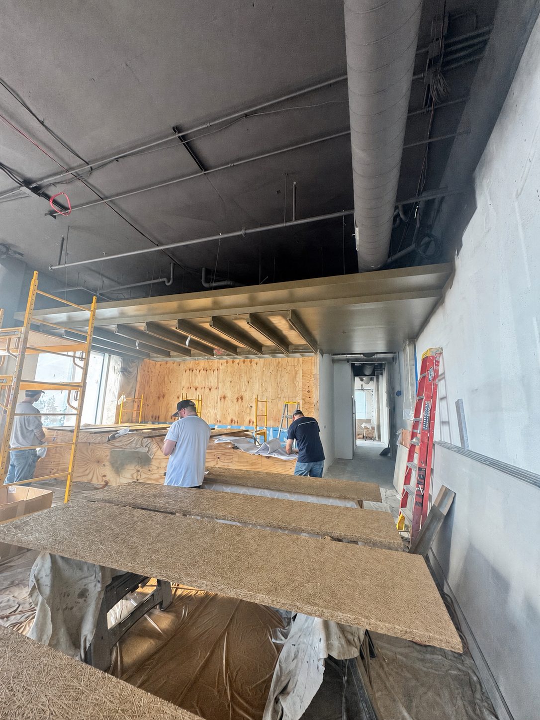 Painted bar ceiling at Libations during construction